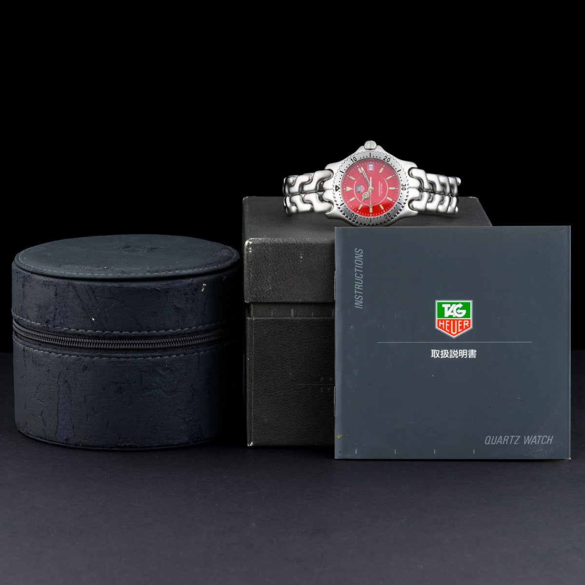 TAG Heuer Professional SEL WG121C Red Dial 34mm Quartz Watch + Box & Manual1